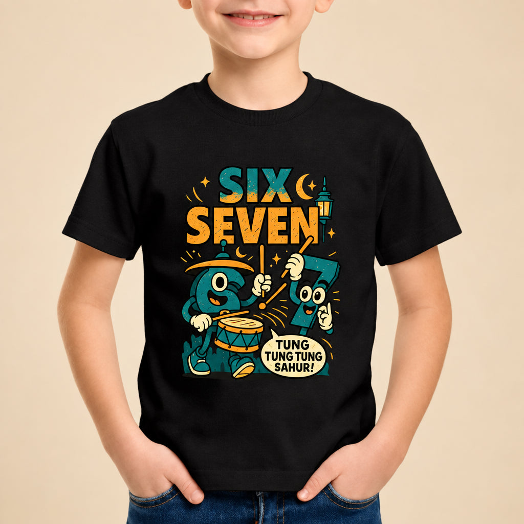 Child wearing a black t-shirt with colorful graphics and text