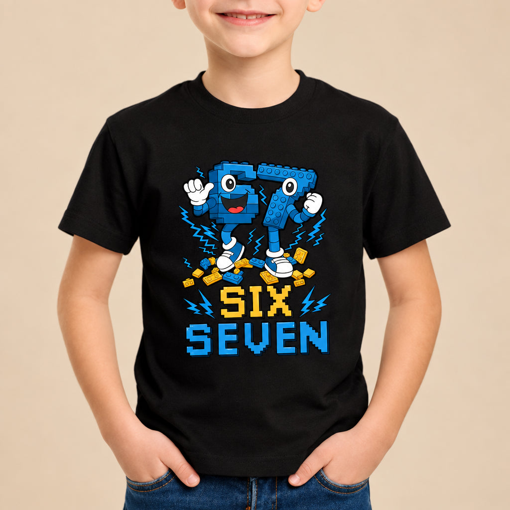 Child wearing a black t-shirt with a blue and yellow design featuring numbers and letters.